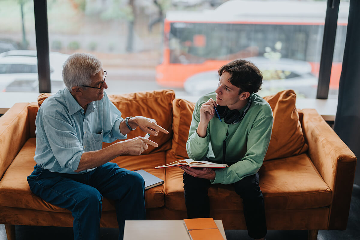 A supportive one-on-one coaching session between a coach and client